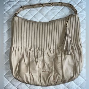 Nude color leather Cole Haan hobo handbag size large.